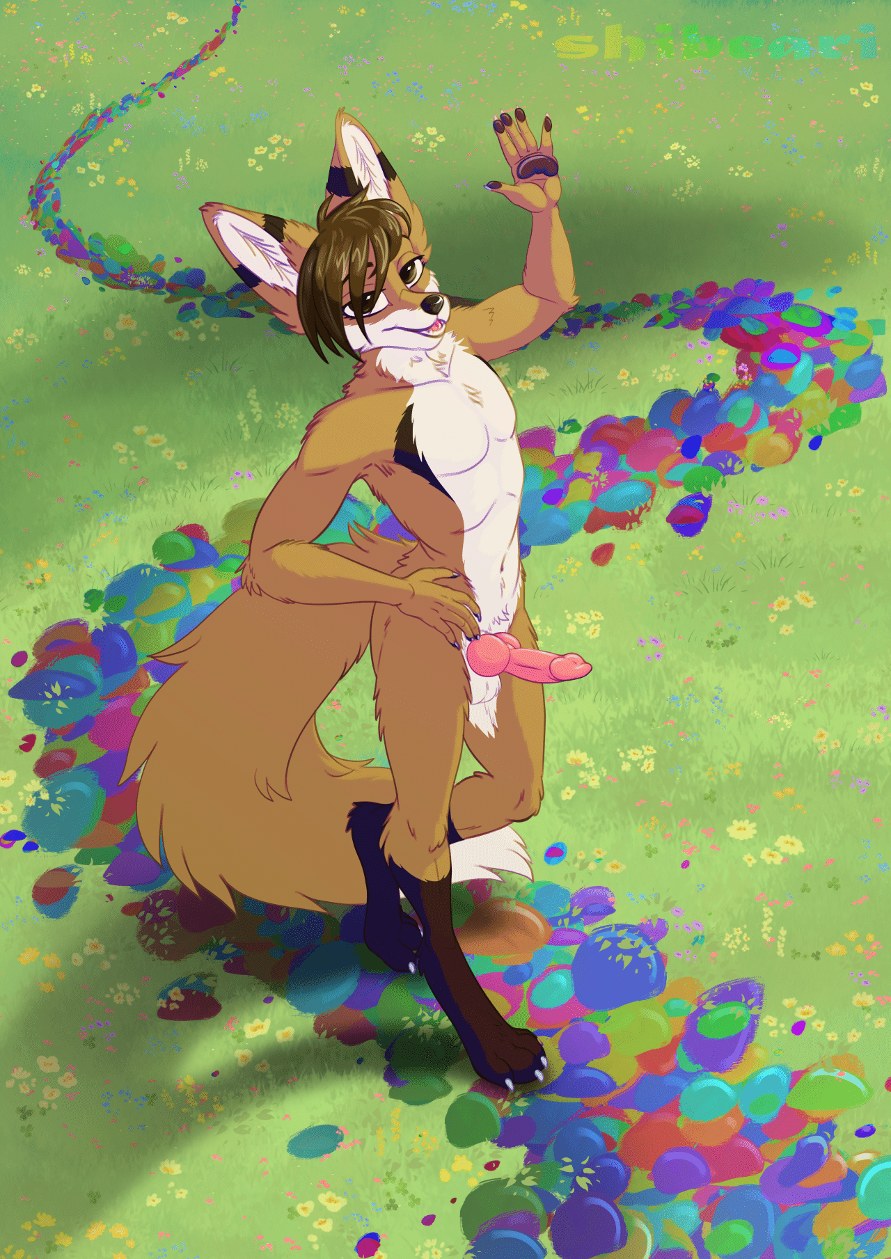 Kobaj walking along a rainbow colored footpath and waving at the camera.