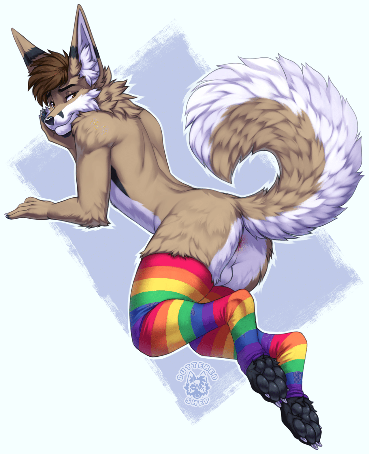 Kobaj looking over his shoulder as he shows off his butt, curly tail, and rainbow programming socks.